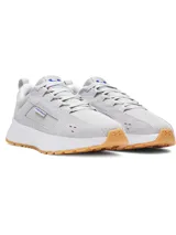 Championes Under Armour modelo Street Mirage de color gris, con parte superior de malla y superposiciones de gamuza, entresuela de EVA blanca y suela de goma con tracción.