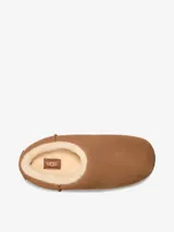 Pantuflas cerradas color marrón claro con interior de piel sintética color crema.