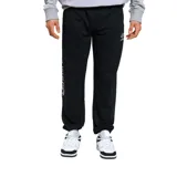 Pantalón de jogging negro con puños elásticos, logo de Umbro estampado en blanco en la pierna izquierda y cierre en los laterales.