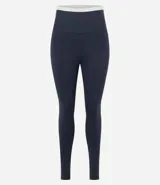 Pantalón legging deportivo color marrón con cintura alta en contraste color blanco. Confeccionado en tejido de poliamida y elastano, de ajuste ceñido al cuerpo.