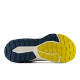 Championes de trail running New Balance Nitrel V6, color gris con detalles en azul y amarillo.