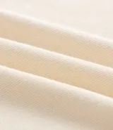 Blusa tipo muscle tee de Ashua, confeccionada en tejido ribana con textura acanalada, cuello redondo y diseño sin mangas.