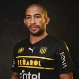 Camiseta de fútbol Puma del Club Atlético Peñarol, color negro con detalles en amarillo y blanco. Incluye logo de Puma, escudo del club, sponsor Antel y BBVA.