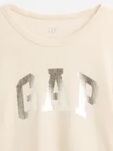 Remera de manga larga confeccionada en tejido tipo waffle color crema, con cuello redondo y logo de la marca estampado en el frente con efecto metalizado.