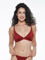 Soutien triangular de diseño minimalista, confeccionado en tela lisa de color negro, con breteles finos ajustables y cierre posterior.