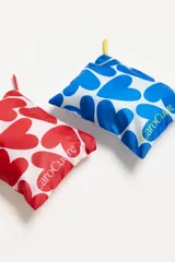 Soutien sin aro de tricot calandrado color negro, con breteles regulables en la espalda.