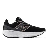Championes de running New Balance 520 V9 para mujer, color negro con entresuela blanca y detalles en gris y dorado rosado. Presentan capellada de malla transpirable, el característico logo "N" en los laterales y tecnología de amortiguación.