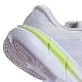 Championes Adidas Questar 4 W para running, color lila con detalles en verde lima y suela blanca.