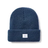 Gorro de lana azul marino con textura acanalada y etiqueta con el logo de la marca Katin en el frente.