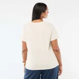 Camiseta de manga corta color beige con estampado botánico y la inscripción "Vintage Botanical" en el frente.