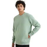 Buzo color verde claro, de corte clásico y cuello redondo.