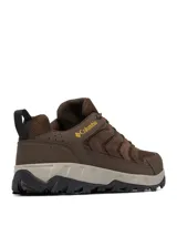 Championes de trekking Columbia modelo Strata Trail Low WP, color marrón con detalles en amarillo y gris, fabricados en malla y gamuza, con suela Omni-Grip y tecnología impermeable Omni-Tech.
