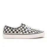 Championes Vans Authentic 44 DX con estampado a cuadros blancos y negros, cordones blancos y suela de goma blanca.