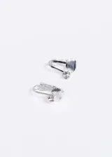 Par de caravanas doradas con forma ovalada y clip, con strass incrustado.