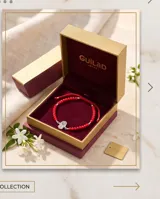 Pulsera de hilo rojo en macramé y cristal con cuentas rojas, dije de mano de Fátima (Hamsa) en plata y cierre ajustable.
