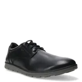 Zapato de vestir Lombardino modelo Koleos, confeccionado en cuero negro con cordones al tono y suela de goma gris con diseño texturizado.