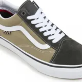 Zapatillas Vans Old Skool color beige y marrón con la clásica sidestripe blanca.