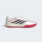Championes de fútbol Adidas modelo Copa Pure IV League Turf, diseñados para césped artificial. Presentan un diseño en color blanco perlado con las icónicas tres tiras en negro y detalles en rojo vibrante en la suela y laterales. Incorporan tecnología Fusionfeel en la parte superior para un mejor control del balón y una suela de goma con tapones diseñados para tracción en superficies sintéticas.
