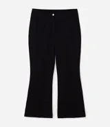 Pantalón de corte flare confeccionado en tejido punto roma, con cintura alta, nervadura delantera y acabado estructurado.