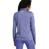 Remera deportiva Under Armour Tech color verde claro jaspeado, de manga larga y cuello con cremallera corta. Logo de la marca estampado en el pecho.