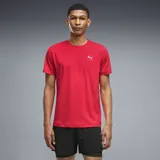 Remera deportiva Puma color rojo neón, de manga corta y cuello redondo, con pequeño logo de la marca estampado en blanco en el pecho.