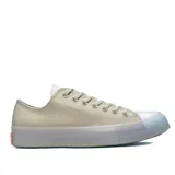 Championes Converse Chuck Taylor All Star CX OX, color beige con suela transparente y detalles en naranja.