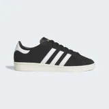 Championes Adidas Jabbar Lo de diseño clásico y minimalista, con parte superior de cuero negro, las icónicas tres franjas laterales en blanco y suela de goma en tono crema.