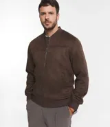 Chaqueta bomber azul marino lisa, con cierre frontal, cuello redondo y bolsillos laterales.