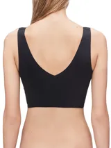 Bralette negro de microfibra sin costuras, con copas sin relleno y tirantes no ajustables.
