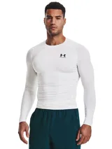 Remera de compresión de manga larga Under Armour, confeccionada en tejido HeatGear ultraligero que absorbe el sudor y se seca rápidamente. Presenta un diseño ergonómico con mangas raglán híbridas y paneles de malla estratégicos en axilas y espalda para mayor ventilación.