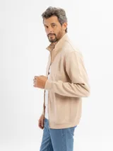 Campera de felpa azul con cierre frontal completo, cuello alto y puños acanalados.