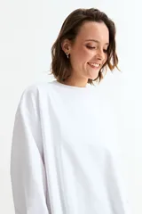 Vestido de algodón de corte recto y holgado, con cuello redondo y mangas largas con puños elásticos.