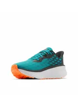 Championes de trail running Columbia Konos Elevate Techlite, en color verde turquesa con entresuela blanca con detalles geométricos y marca en color naranja.