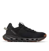 Championes Columbia modelo Terrastride Aro, color negro con suela de goma en tono marrón. Presentan un diseño transpirable con orificios de ventilación en la entresuela, correas dinámicas y cierre con cordones.