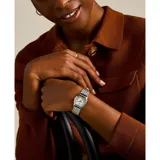 Reloj Fossil modelo Harlow con caja octogonal de acero inoxidable plateado y pulsera de eslabones a juego. Presenta una esfera color crema con números romanos negros y manecillas finas.