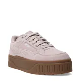 Championes urbanos Puma modelo Karmen II Idol SD, con capellada de gamuza en color rosado y suela de plataforma alta en color marrón con diseño estriado.