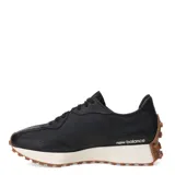 Championes New Balance modelo 327, color negro, con detalles en cuero y suela de goma color caramelo.