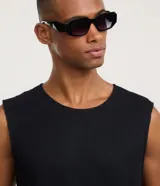 Musculosa masculina de tejido de punto texturizado color blanco, con escote redondo y corte regular.