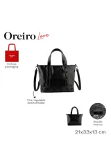 Cartera tipo tote de Las Oreiro en color negro, con acabado brillante. Presenta detalles de ojales metálicos decorativos en el frente y en la base, junto con un pequeño logo en forma de labios. Incluye doble asa de mano y correa larga ajustable y extraíble.