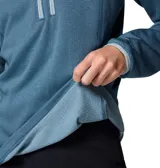 Buzo polar Columbia de mujer con cierre frontal parcial, cuello alto y bolsillo con cierre en el pecho. Presenta un diseño técnico con tecnología Omni-Wick para absorción de humedad y ribetes en contraste en cuello y puños.