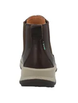 Botín de cuero marrón tipo Chelsea con paneles elásticos laterales, suela de plataforma de espuma color beige con tecnología honeyfoam y puntera redonda.