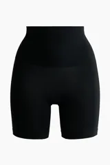 Culotte de punto color negro, de tiro alto, con efecto moldeador en cintura y caderas, y efecto push-up en los glúteos. Diseñado con el mínimo de costuras para un ajuste cómodo y una sensación suave.