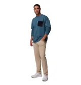 Pantalón beige de la colección ROC de Columbia, de corte recto y tejido elástico, con trabillas, bolsillos funcionales y detalle reflectante en los puños.
