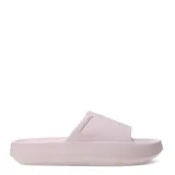 Chanclas de goma color beige de suela gruesa y diseño slide con textura en relieve y logo de la marca en la tira.