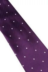 Corbata verde oscuro con estampado floral y pañuelo de bolsillo a juego.