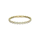 Pulsera dorada con cristales blancos redondos engarzados en cristal pavé transparente.