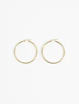 Aros tipo argolla de acero quirúrgico hipoalergénico color plateado.