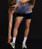 Bermuda deportiva de hombre Get Over, modelo running perforada, confeccionada en poliéster de color negro, con cintura elástica y cordón ajustable.