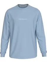 Remera celeste de manga larga Calvin Klein Jeans, con cuello redondo y logo estampado en el pecho.