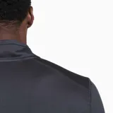 Buzo deportivo negro de poliéster reciclado y spandex, con cierre de un cuarto, mangas largas con orificios para los pulgares y logo Merrell estampado en el pecho.